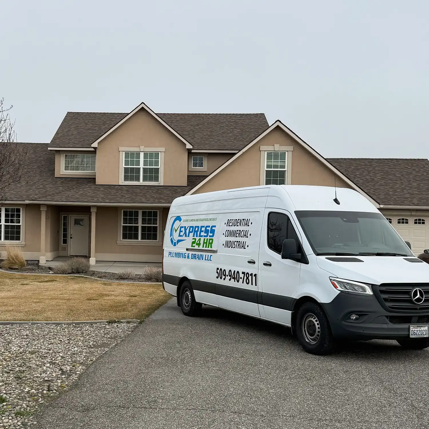 Express 24 HR Plumbing and Drain service van outside a home